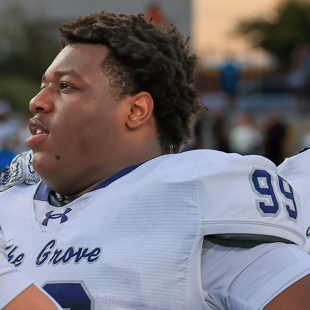 Kristopher Williams on the sideline with his helmet off